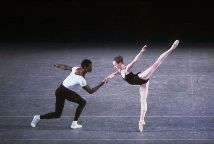 Heather Watts in a penché, supported by Mel Tomlinson in a performance of Agon