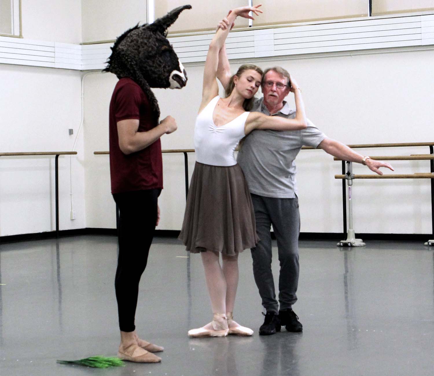 Miriam Miller and Preston Chamblee (in a donkey head) coached by Bart Cook in A Midsummer Night's Dream
